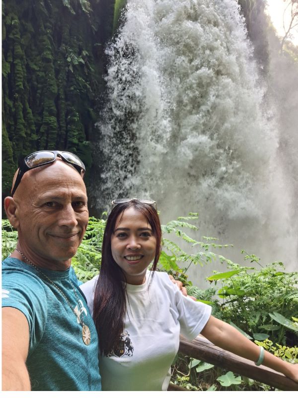 East Java Tours owners Brandon and Jessica at a secret jungle waterfall